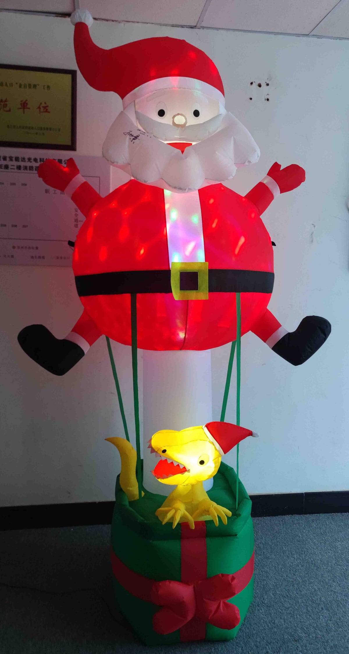 96 in. Lighted Inflatable Santa with Dinosaur Gift Box Christmas Yard Decoration - media 1